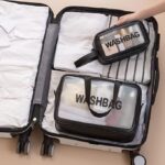 ⁦حقيبة لون اسود سفر لمستحضرات التجميل للنساء والرجال استحمام شفافة غير لامعة مع مقبض عملي منظم مستحضرات للسفر  حمل ادوات الزينة بولي فينيل كلورايد يوريثين⁩ - الصورة ⁦2⁩